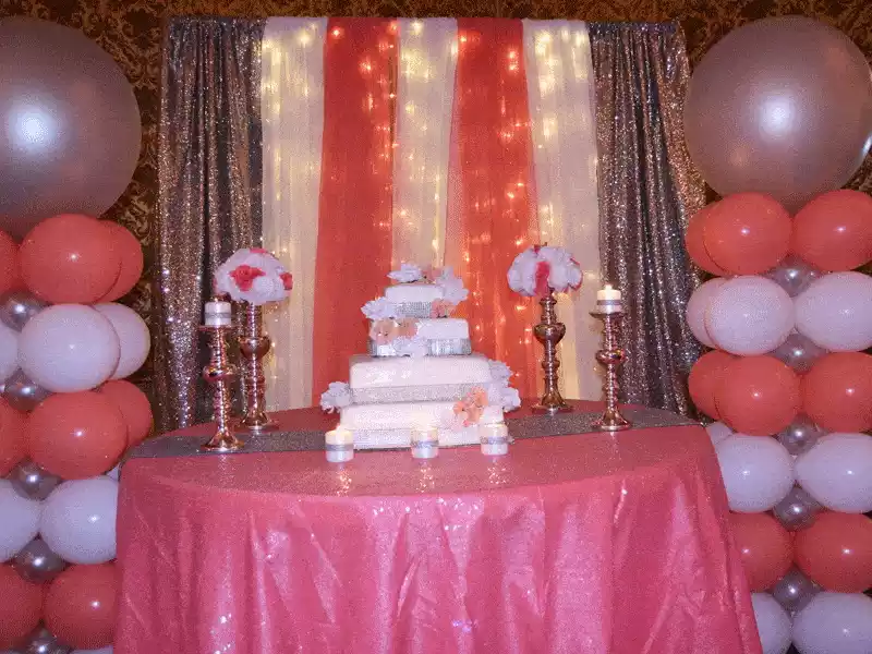 Cake table decor and bacdrop for quinceanera in coral white and silver