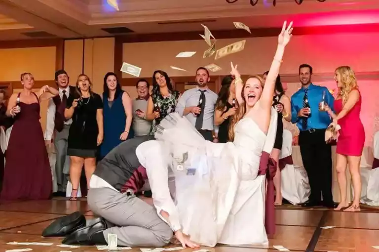 The garter removal at a wedding reception