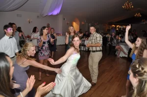 A bride dancing at her wedding and having fun