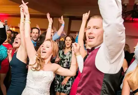 Newlyweds dancing at wedding