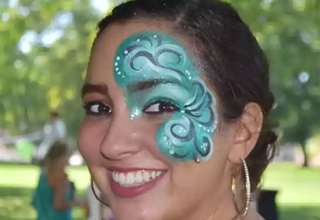 Face paint on a young woman at a PartyMasterz event